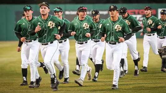 Cal Poly players head to the dugout.