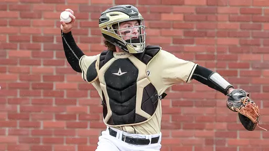 Ryan Stafford throws the ball back to his pitcher.