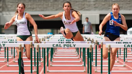 Mustangs compete in women's 100 hurdles.
