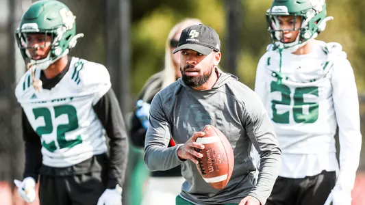 Asa Jackson coaching the cornerbacks.