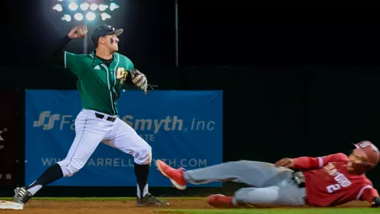 Brooks Lee turns double play.
