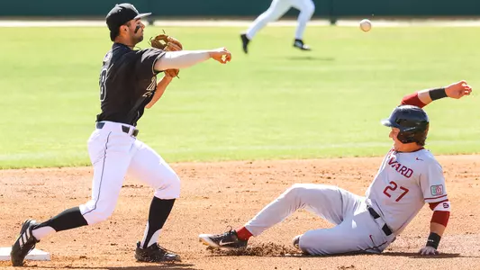 Second baseman Nick Marinconz makes the turn in double play attempt versus Harvard four weeks ago. Cal Poly resumes Big West play this weekend at home against Long Beach State.