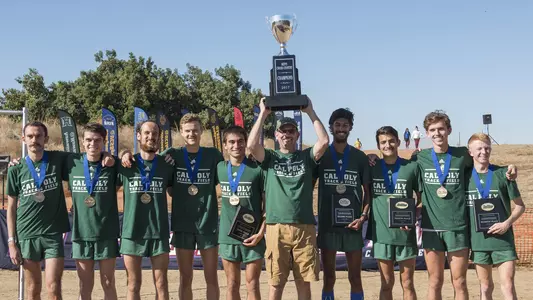 Mark Conover hoists Big West trophy in 2017.