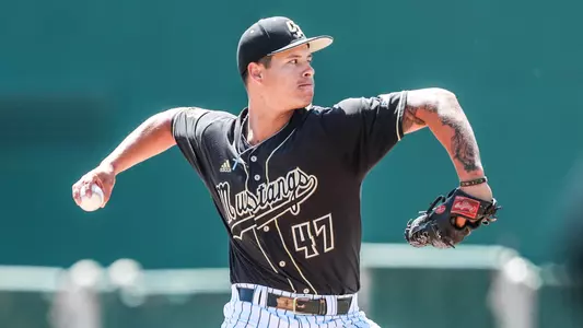 Dylan Villalobos throws a pitch.