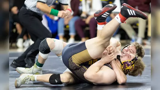 Bernie Truax wrestles at Pac-12 finals.