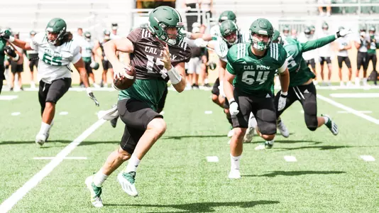 Spencer Brasch scrambles for yardage.