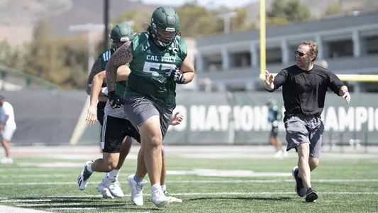 Will Plemons coaches his players.