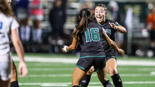 Olivia hugs Balanon after goal, UCSB, 9-15-22