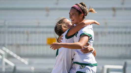 Penn hugs Marquez after goal, Hawai'i, 9-25-22