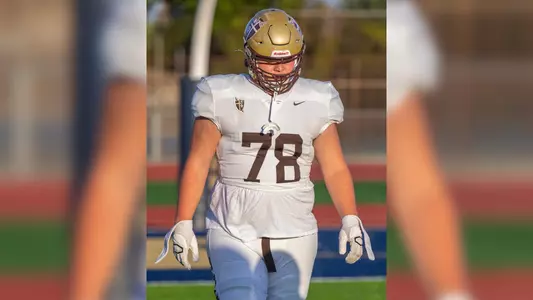 Racin Delgatty of St. Francis signs National Letter of Intent.