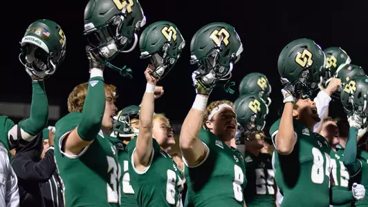 Cal Poly celebrates win over Portland State in 2022.