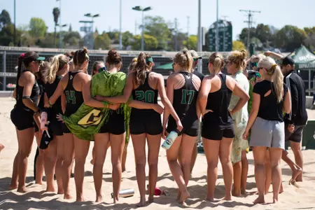 Beach Volleyball Team Huddle