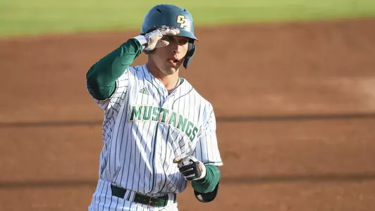 Collin Villegas circles the bases after hitting a home run.