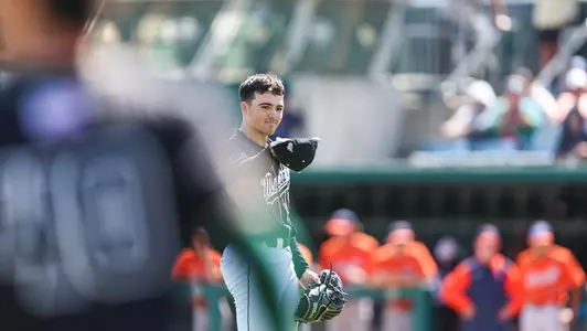 Jakob Wright doffs his cap after securing final out.