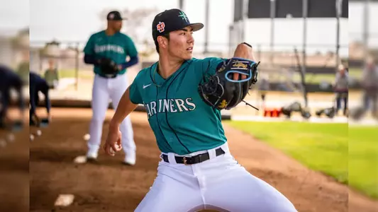 Bryan Woo warming up in the bullpen.