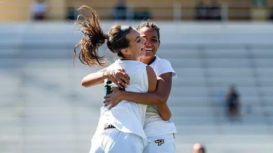 Emily Nedom, Annika Smith hug, 092224, Nevada