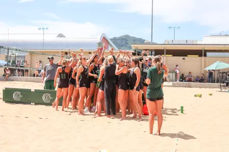 Beach Team huddle 2025