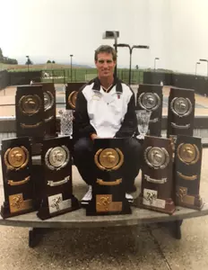 Hansen with the tennis team's haul in 1995