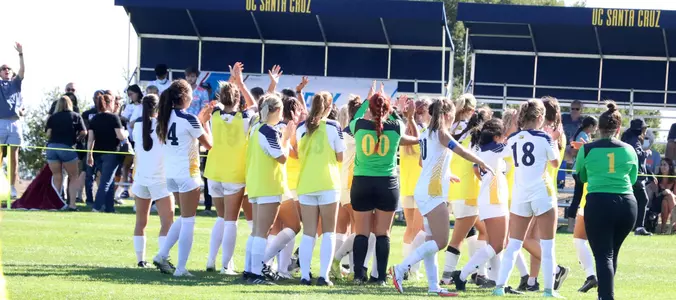 Soccer celebrates after Oxy win