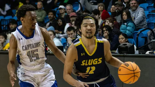 Yasukochi drives to hoop