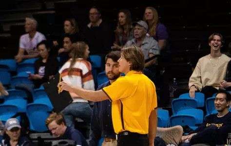 Landel discusses strategy with Lennon before a match