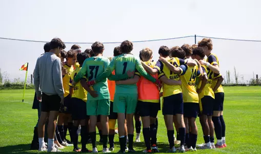 men's soccer huddle