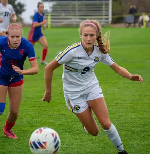 Chelyn Ackerman chases down the ball