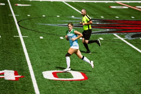 Carson Bohnenstiehl running up the pitch