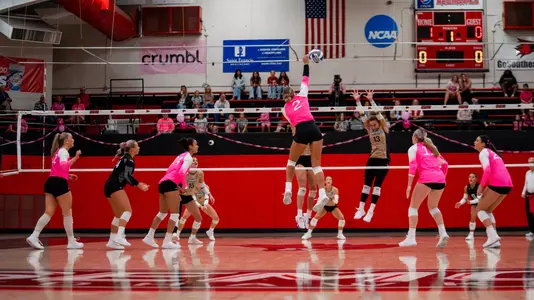 Lucy Arndt high in the air for an attack