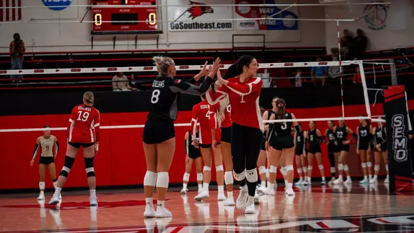 Nina Schuberth and Holland Guilliams high five in-between points