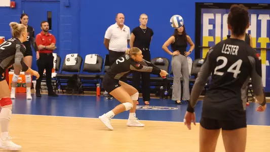 Lucy Arndt digs the attack to set up the Redhawkls