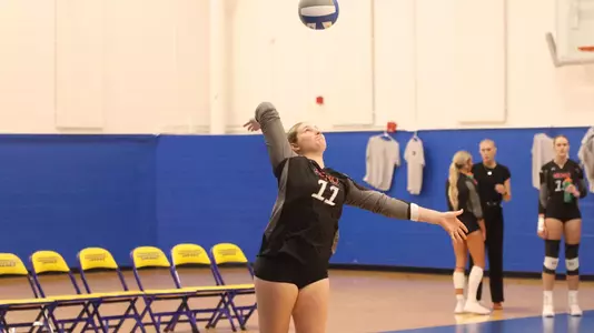 Megan Holder serves to start the point