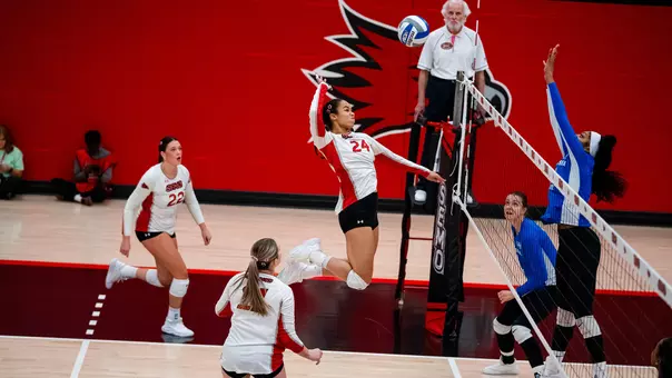 Alaina Lester with a kill from her middle position