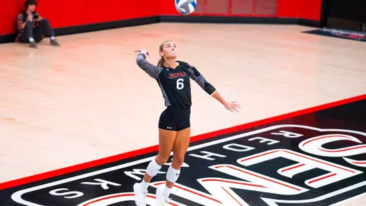 Ellie Burns serves