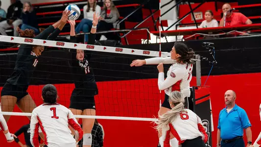Katy St. John watches her attack get through the block
