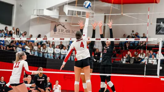 Marin Johnson with a high tip over the defense