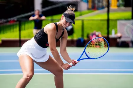 Kristina Kozakova waiting for her doubles partner to serve