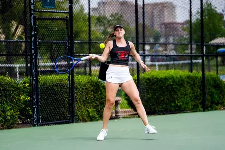 Mia Mayerova ripping a forehand return
