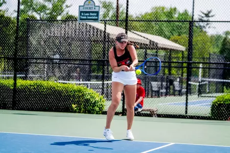 Mia Mayerová making contact on a backhand