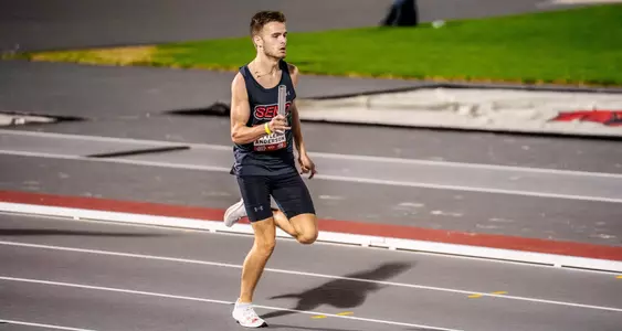Tyler Anderson running down the straight in a relay