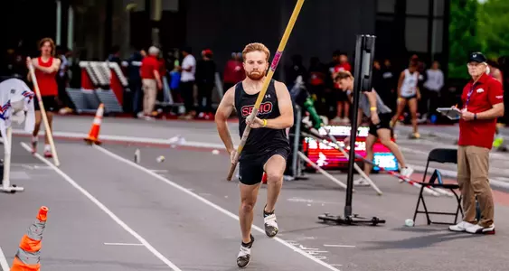 Colin Beers running down the pole vault shoot
