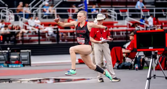 Molly Grohmann starts her high jump attempt with a big stride