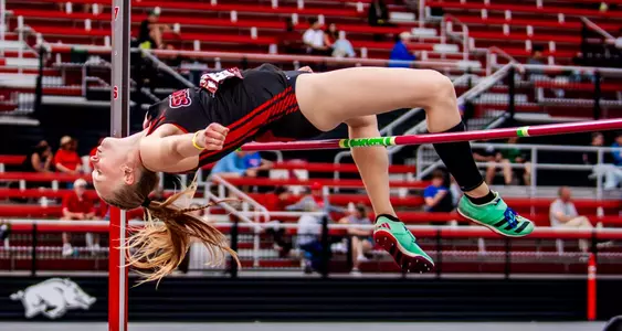 Molly Grohmann clears the bar on her pole vault attempt