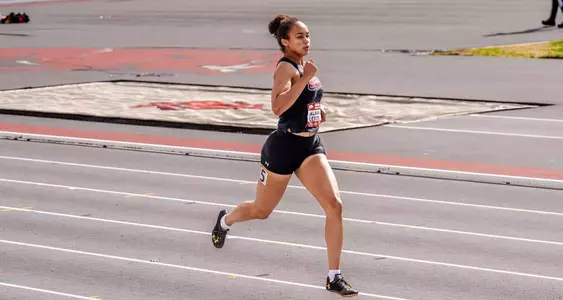 Alaina Lester wrapping up her race charging for the finish line