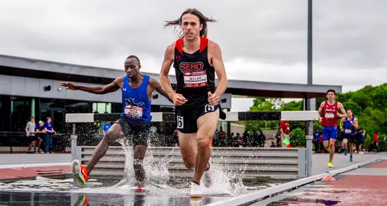 Myles Thornburg lands in the steeplechase pool ahead of the opposition