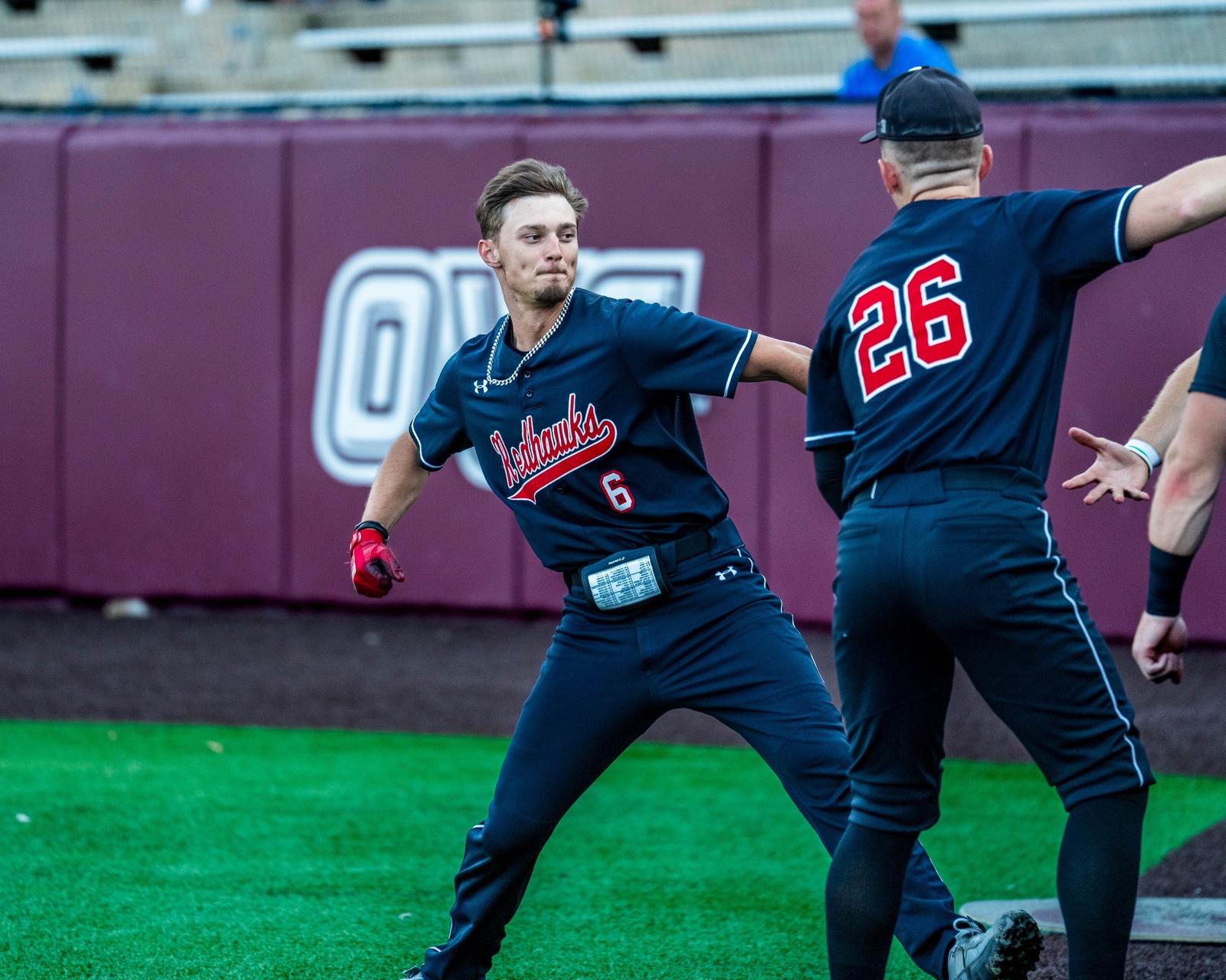 Baseball Beats Little Rock, Demitri Shakotko celebrates a home run
