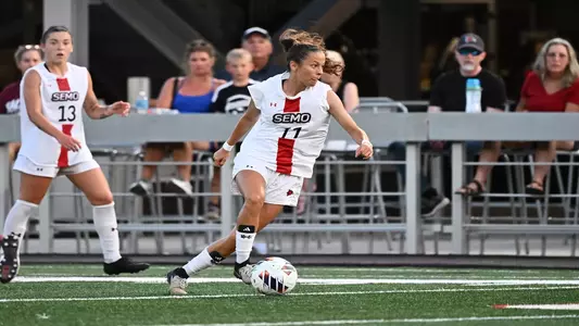 Maria Lopez looks for a pass
