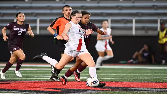 Jasmine Barney fights for possession against SIU
