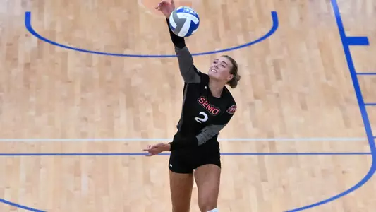 Lucy Arndt hits from the back line