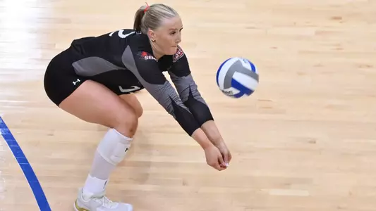 Reagan Nelson getting low to keep the ball alive